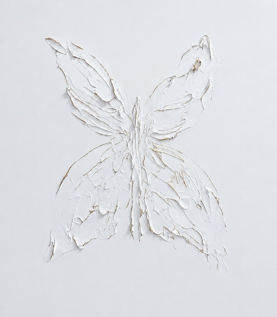 A butterfly built from thick white paint on a white canvas, its edges traced with fine lines of gold.